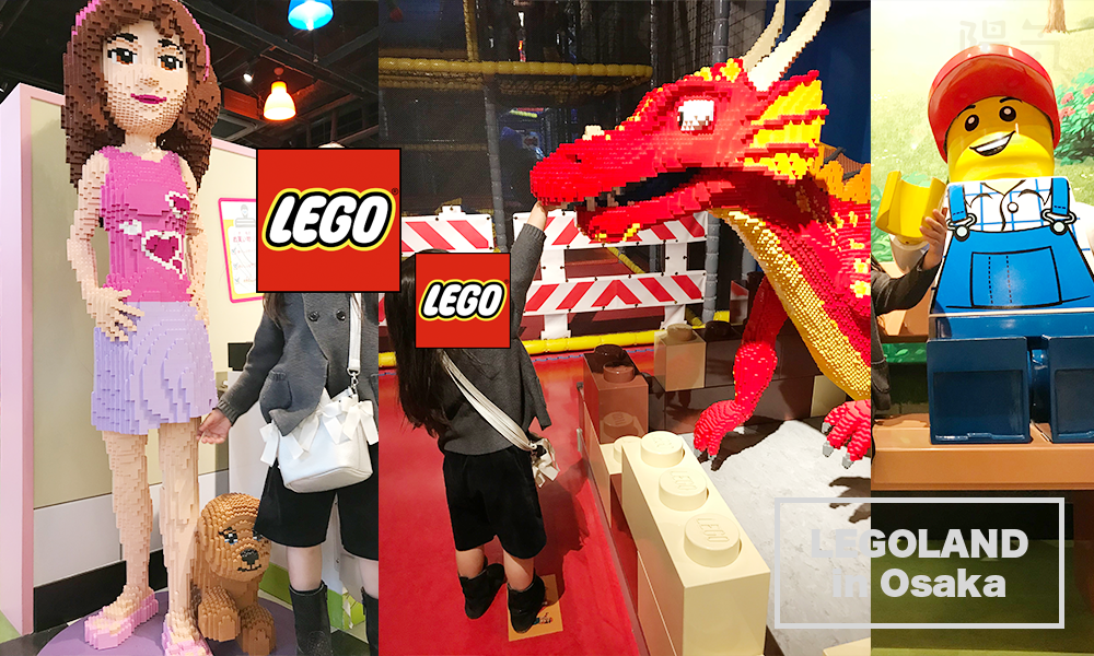 レゴでできた巨大なドラゴンの口に手を入れる娘